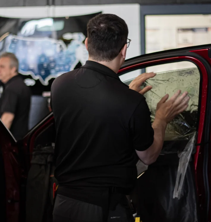 Professional auto window tinting technician at Woodlands Window Tint, The Woodlands TX
